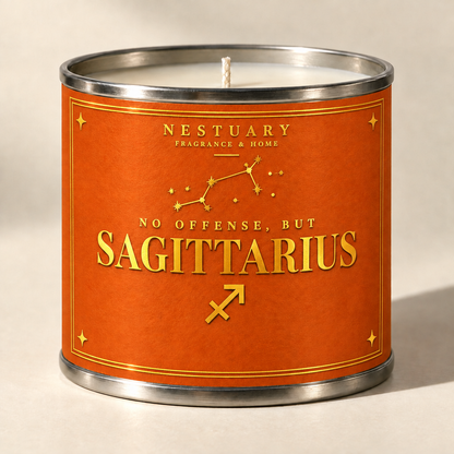NESTUARY Sagittarius zodiac candle, orange label with gold foil lettering, NO OFFENSE, BUT